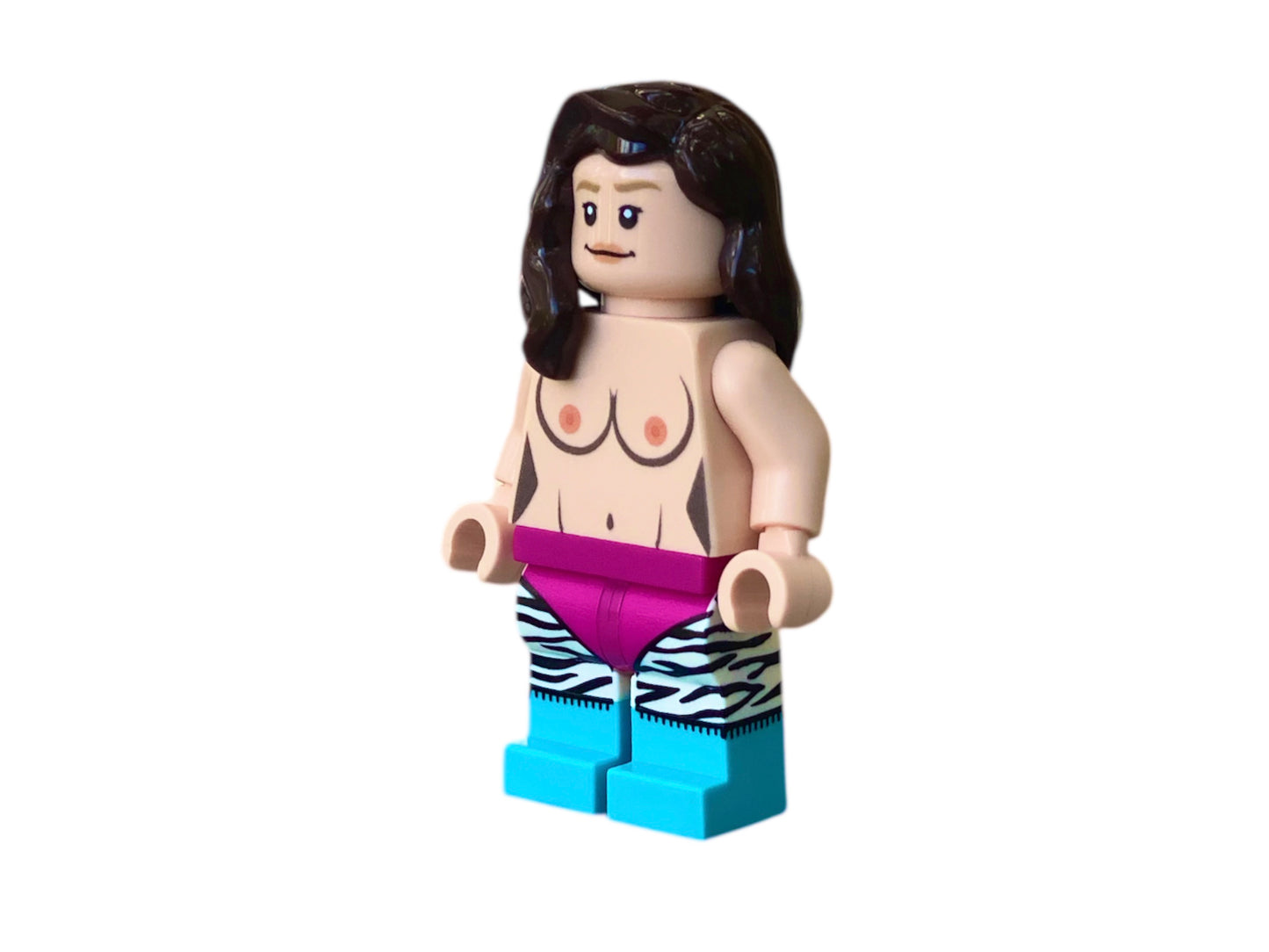 Naked building block figure with breasts & zebra leggings
