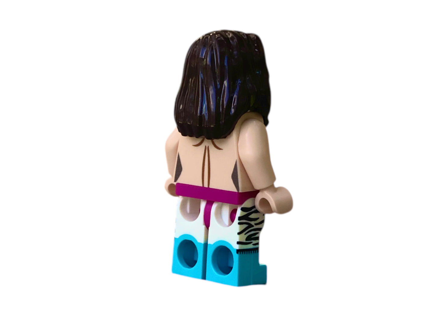 Naked building block figure with breasts & zebra leggings